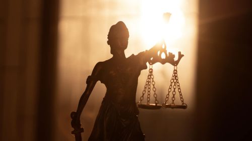 Statue of Lady Justice. Symbol of fair treatment under law. Visual for employment law blog discussing the U.S. Supreme Court decision in Muldrow v. City of St. Louis.