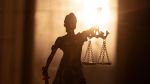 Statue of Lady Justice. Symbol of fair treatment under law. Visual for employment law blog discussing the U.S. Supreme Court decision in Muldrow v. City of St. Louis.